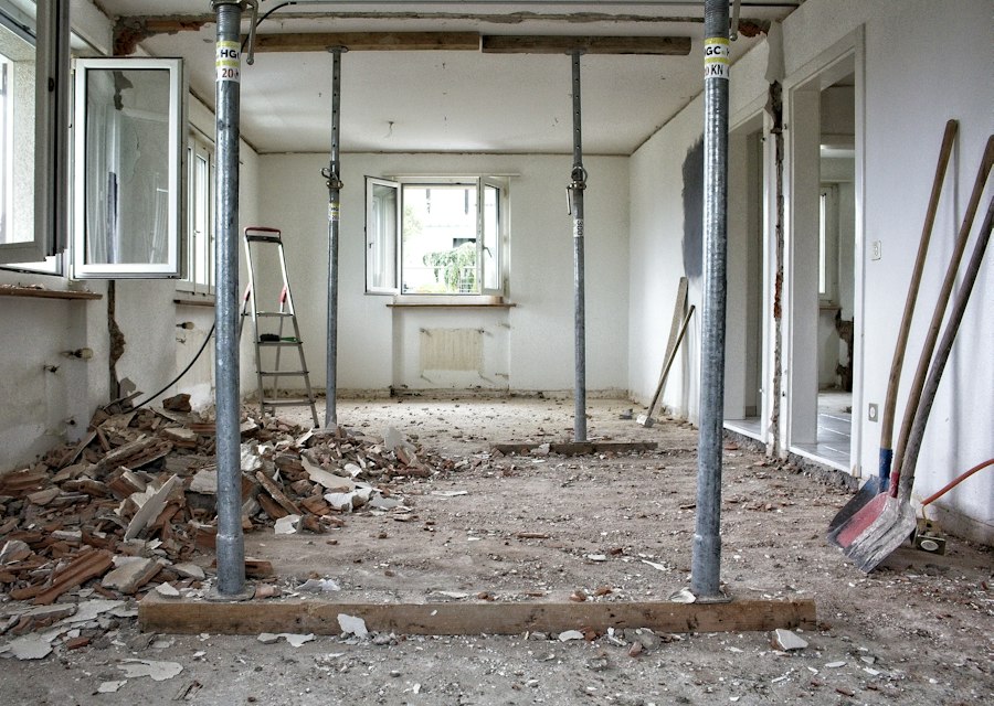 Renovation room with drywall installed and tools on site